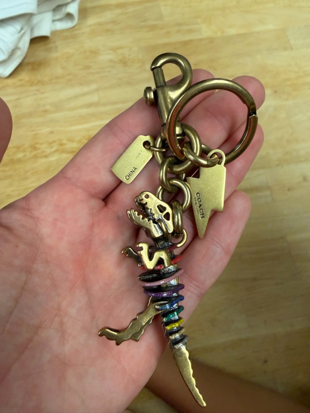 Coach colorful Dinosaur Keychain - Picture 10 of 10